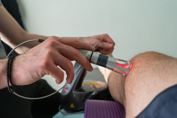 cold laser therapy applied on patient leg